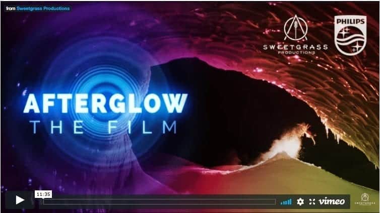 Skiers Light Up The Mountains Wearing Light Suits