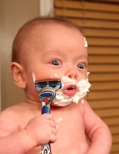 dad photoshops baby doing adult tasks