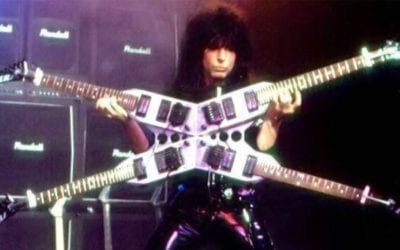 Rocker Shreds Four Neck Guitar